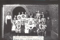 No.-1-School-House-pupils and teacher Mrs. Ida Sprague (Mrs. Frank Strong).